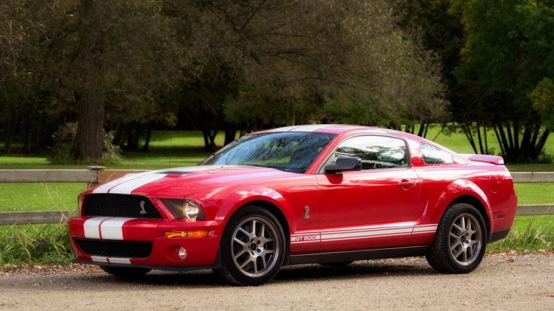 Mustang Auto - red chevrolet camaro on road