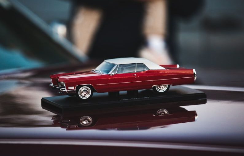 Mustang Auto - a toy car is sitting on top of a table