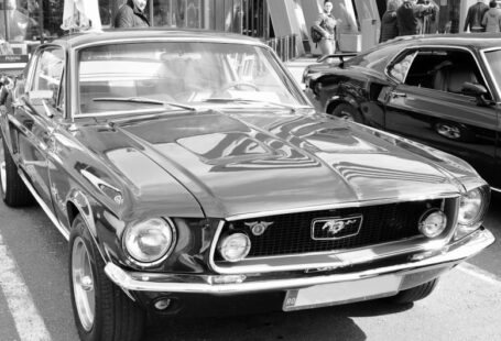 Mustang Auto - a black and white photo of a mustang