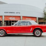 Mustang Auto - red and white convertible coupe