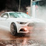 Mustang Auto - Parked White Coupe during Night