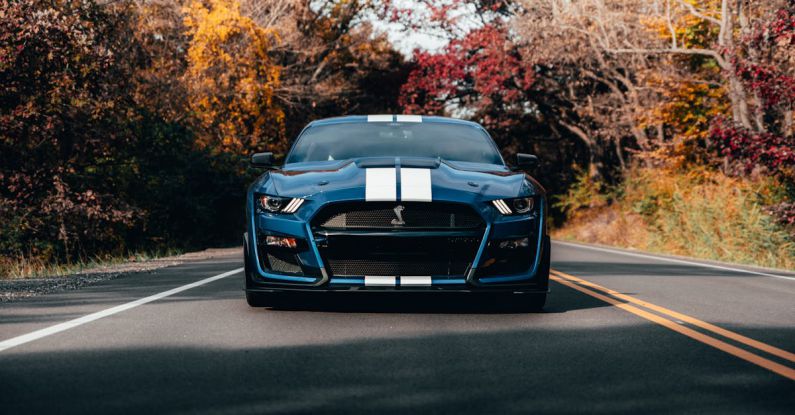 Mustang Auto - Photo of Blue Mustang on Road