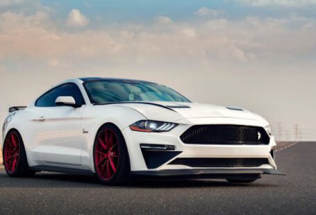 Mustang Auto - Photo of White Mustang on Aspahlt Road