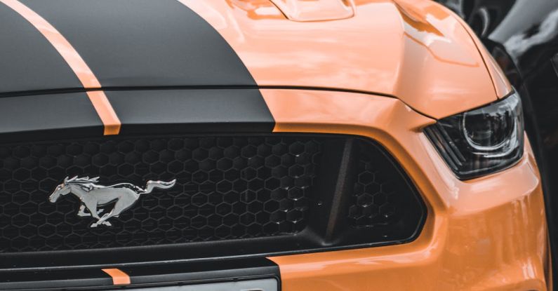 Mustang Auto - Close-up of Modern Orange Sport Car